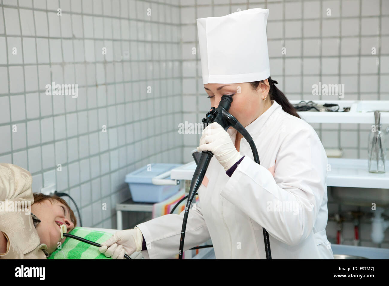 Doctor and patient during endoscopy exam in clinic Stock Photo Alamy