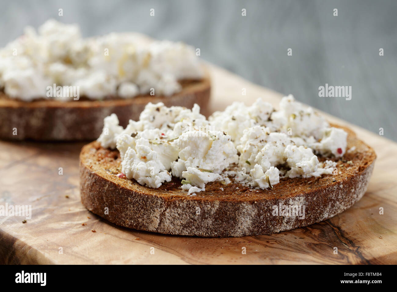 rye bread grated with garlic and ricotta cheese Stock Photo Alamy