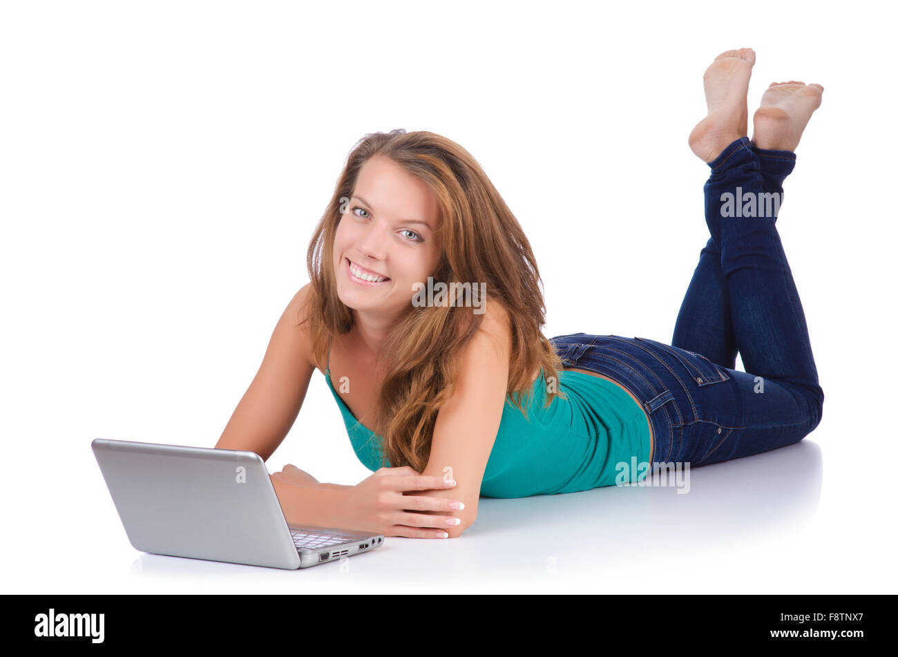 Pretty girl using laptop isolated on white Stock Photo - Alamy