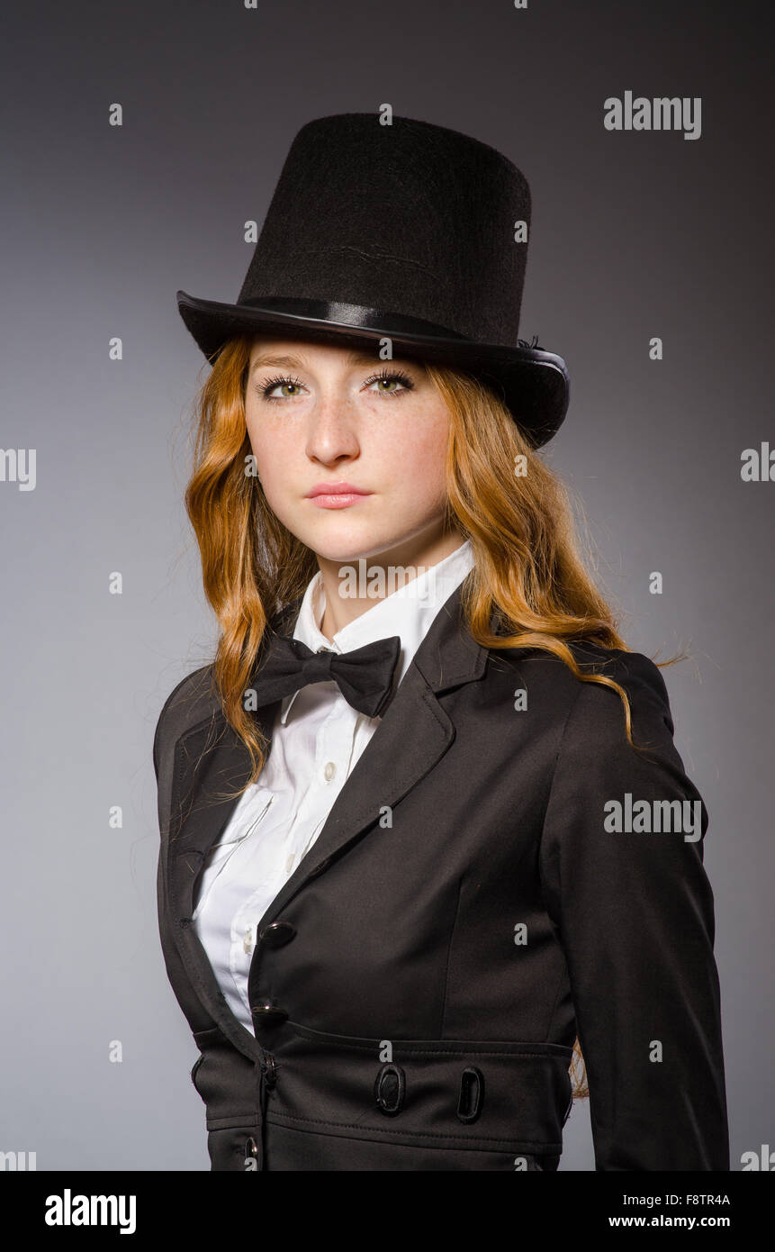 Pretty girl wearing retro hat isolated on gray Stock Photo - Alamy