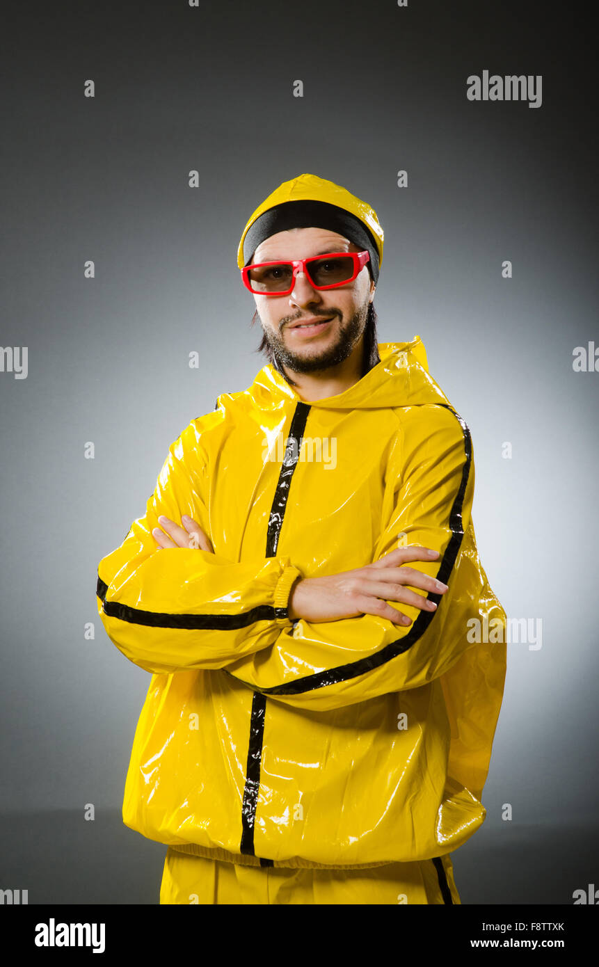 Funny man wearing yellow suit Stock Photo Alamy