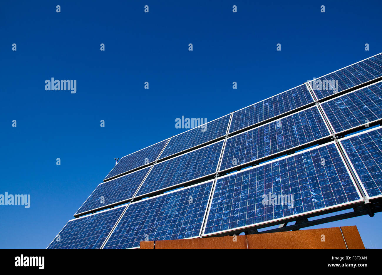 Solar energy panel in front of a blue sky Stock Photo