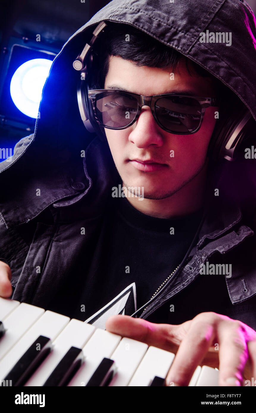 DJ mixing music at disco Stock Photo Alamy