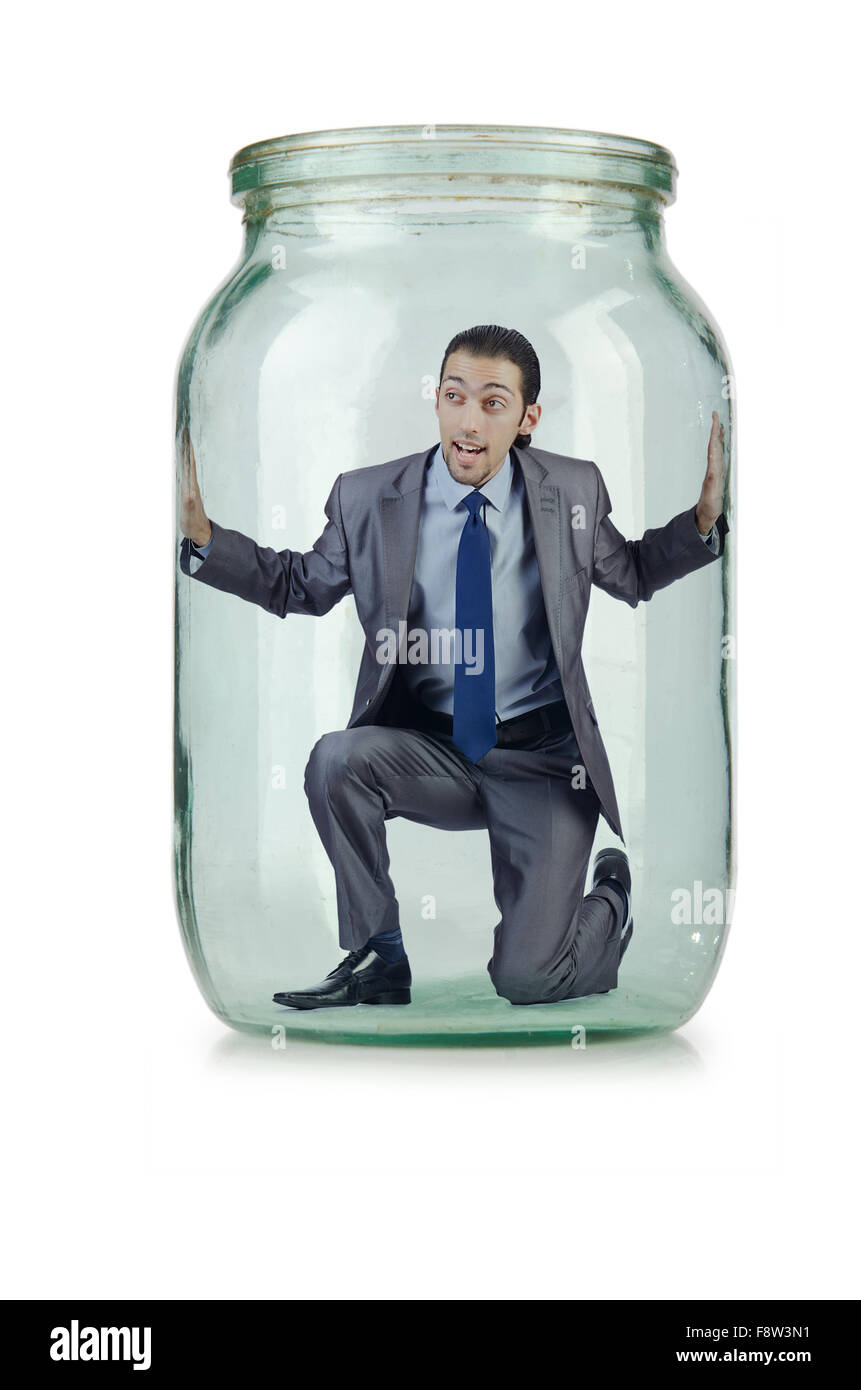 Young businessman in glass jar Stock Photo