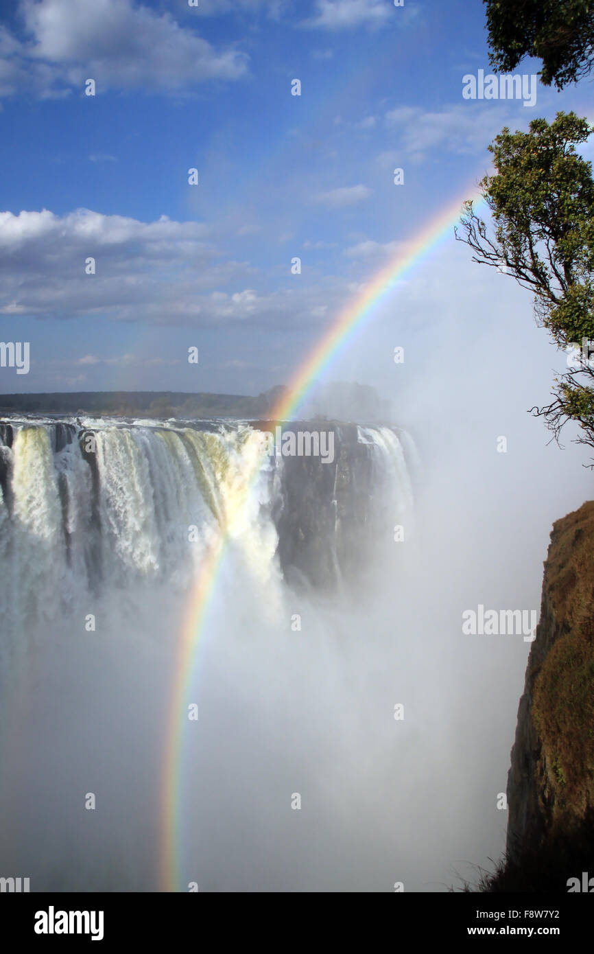 Victoria Falls with Rainbow, Zimbabwe Stock Photo