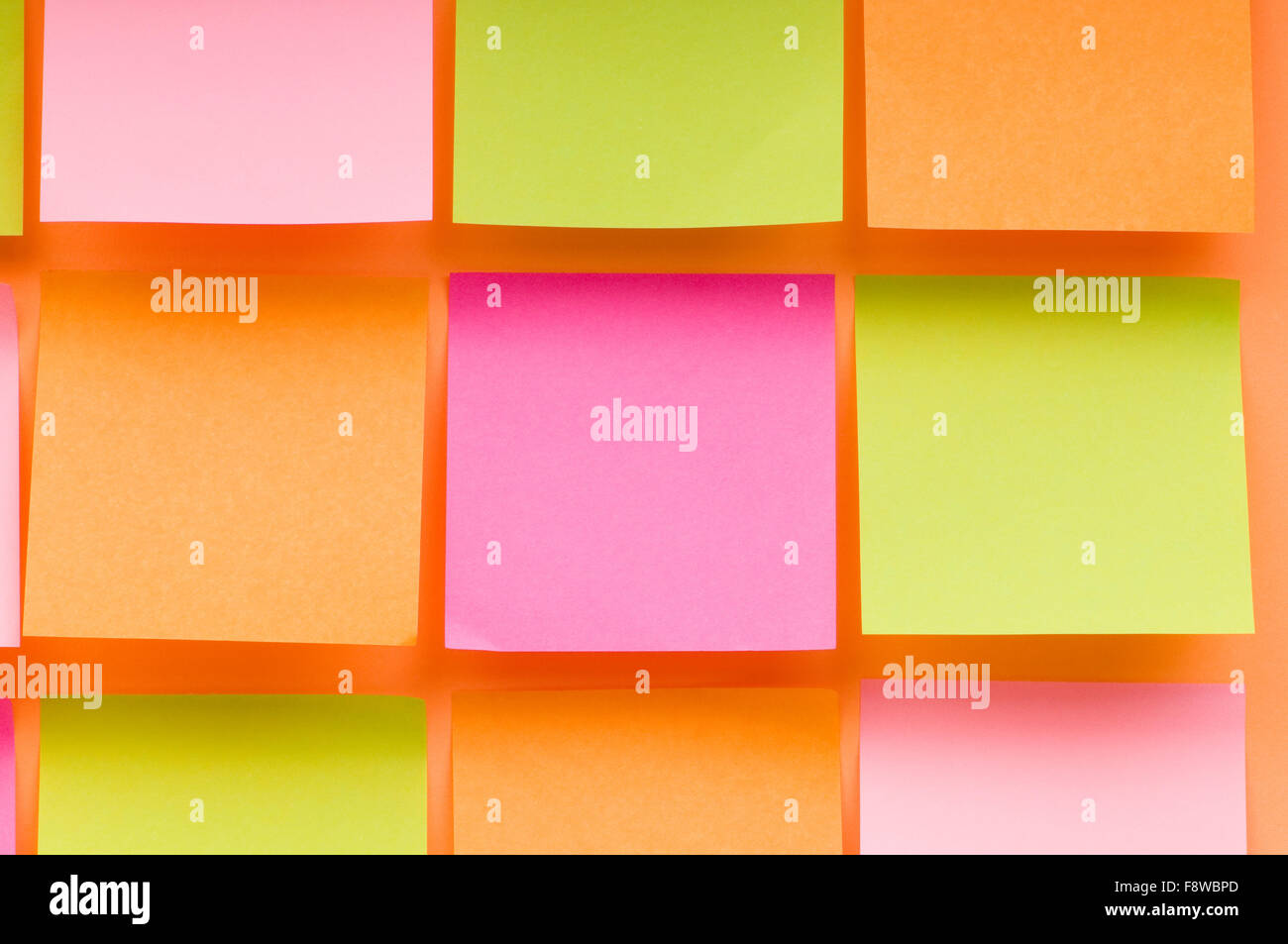 Reminder notes on the bright colorful paper Stock Photo - Alamy