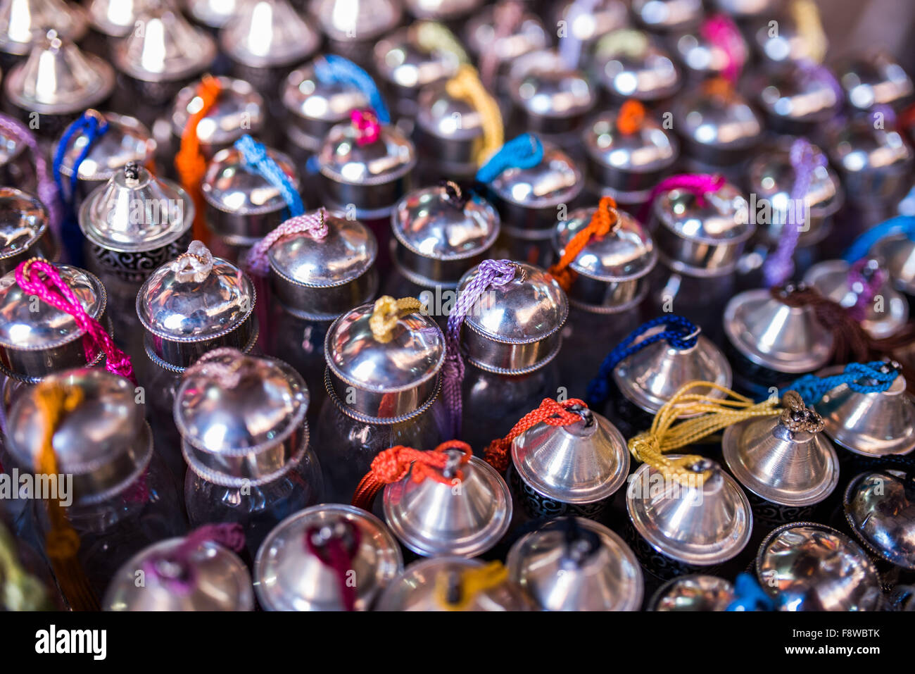 Tasseled silver topped glass vials for sale in the souks of Marrakesh Stock Photo Alamy