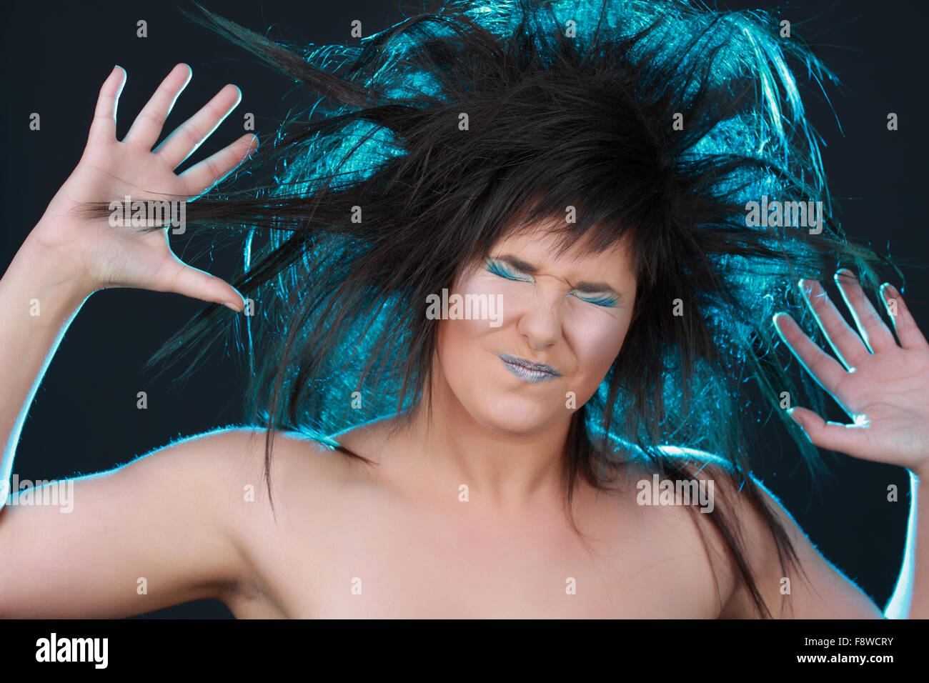 girl with blue electric hair Stock Photo Alamy