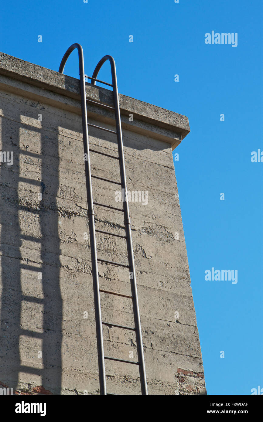 Steel ladder shadow Stock Photo - Alamy