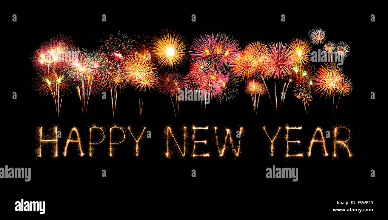 Happy New Year made of sparkles firework at night background Stock Photo