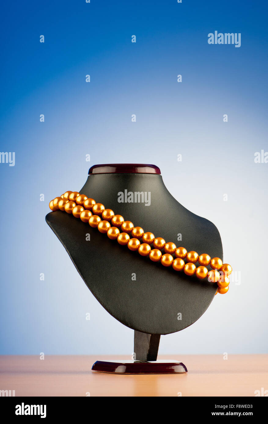 Pearl Necklace Against Gradient Background Stock Photo Alamy