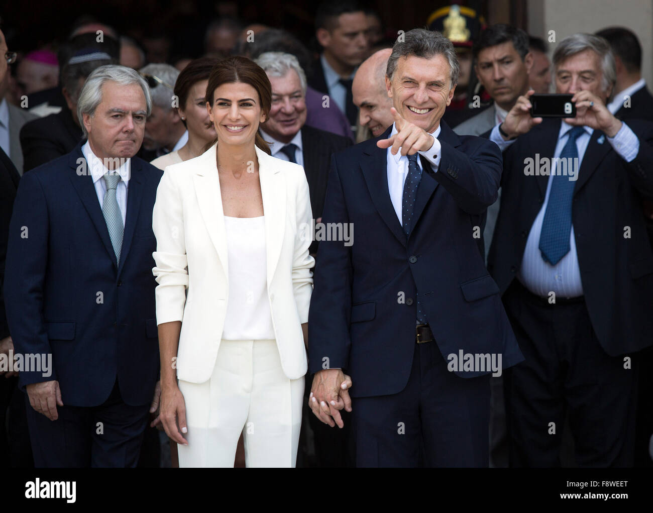 Buenos Aires, Argentina. 11th Dec, 2015. Argentina's President Mauricio Macri (2nd R) leaves with First Lady Juliana Awada (2nd L) after taking part in the Tedeum at the Metropolitan Cathedral in Buenos Aires, capital of Argentina, Dec. 11, 2015. According to local press, Mauricio Macri attended Friday with Argentina's Vice President Gabriela Michetti and his Cabinet the traditional religious service at the Metropolital Cathedral, one day after his pesidential inauguration. Credit:  Martin Zabala/Xinhua/Alamy Live News Stock Photo