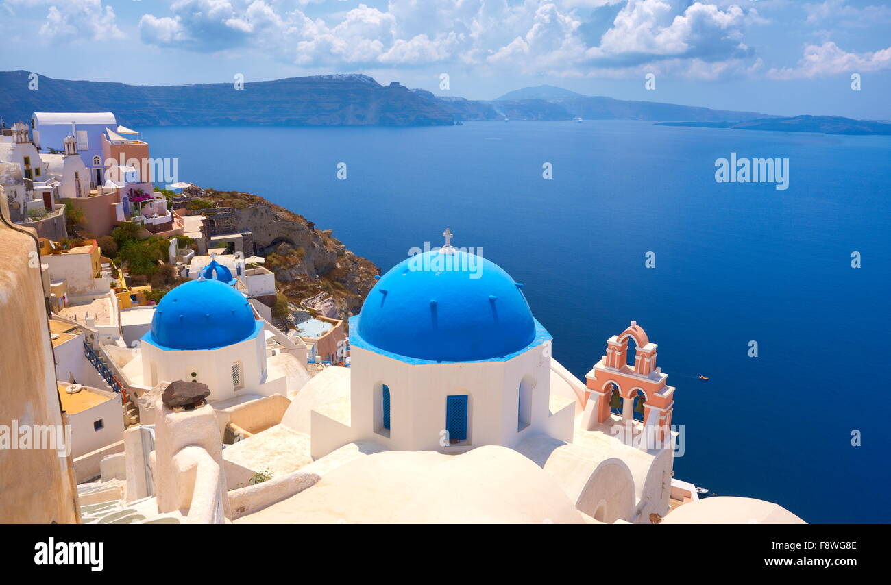 Santorini landscape with greek white church, bell tower and Aegean Sea in the background, Oia Town, Santorini Island, Greece Stock Photo