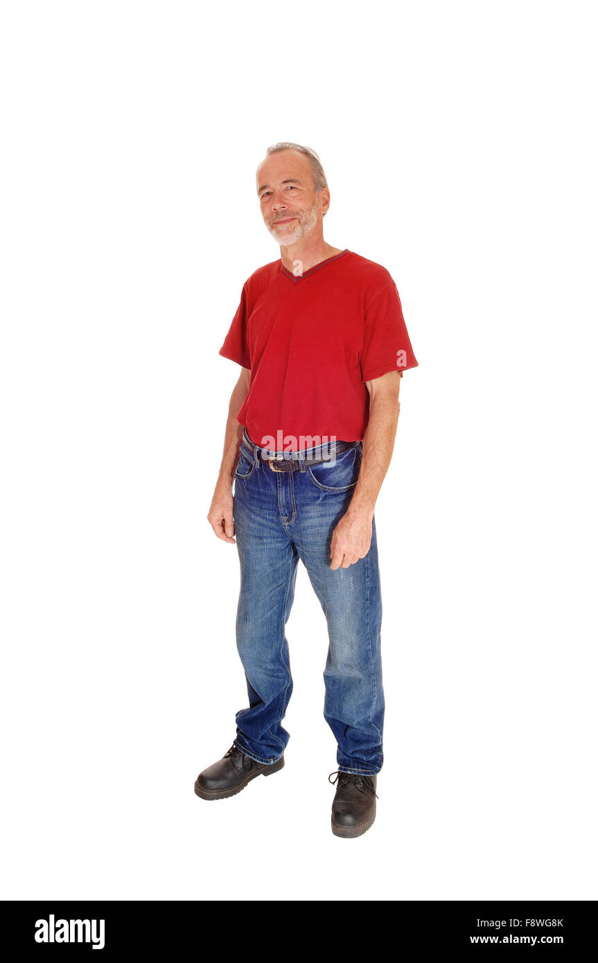 A middle age male in a red t-shirt standing isolated for white background and looking angry. Stock Photo