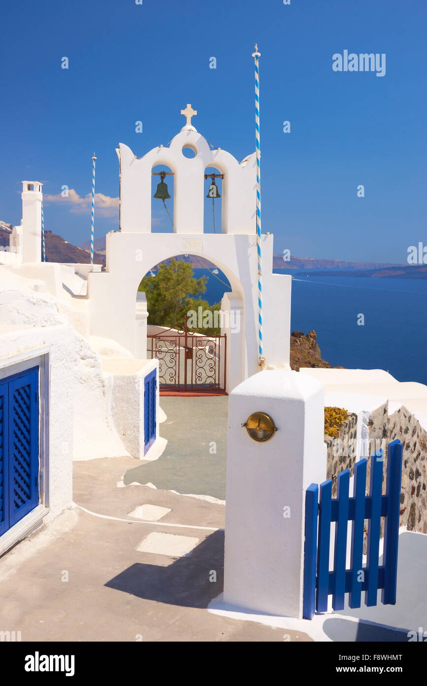 The gate with bell tower in Oia Town, Santorini Island, Cyclades Islands, Greece Stock Photo