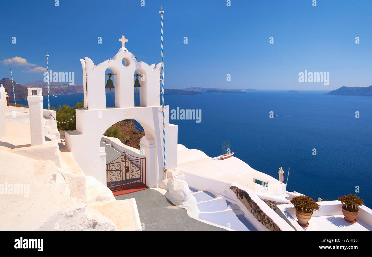 The gate with bell tower in Oia Town, Santorini Island, Cyclades Islands, Greece Stock Photo