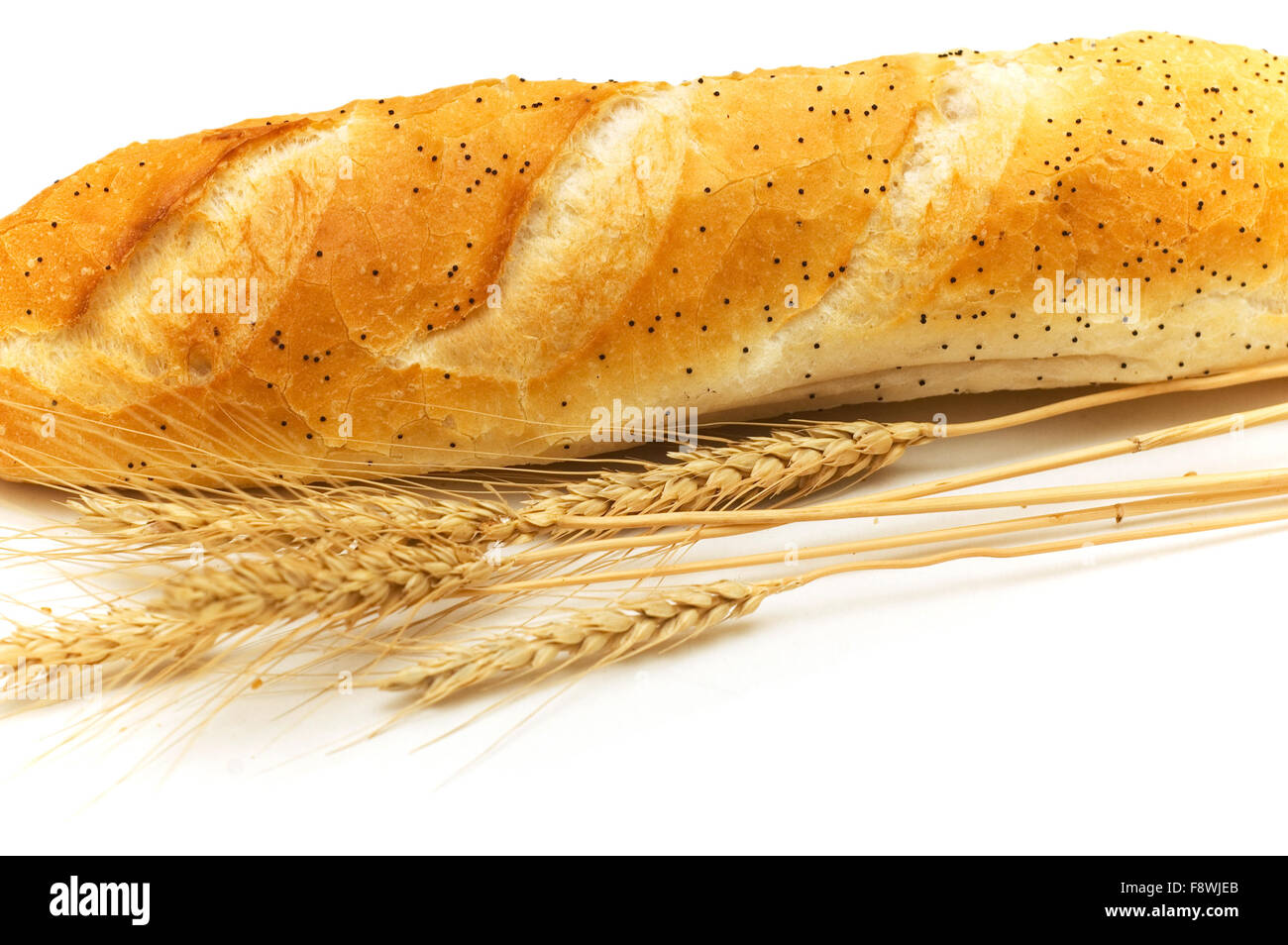 Bread and wheat ears isolated on white Stock Photo - Alamy