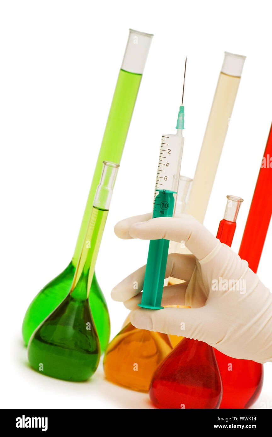Hand with syringe and tubes isolated on white Stock Photo Alamy