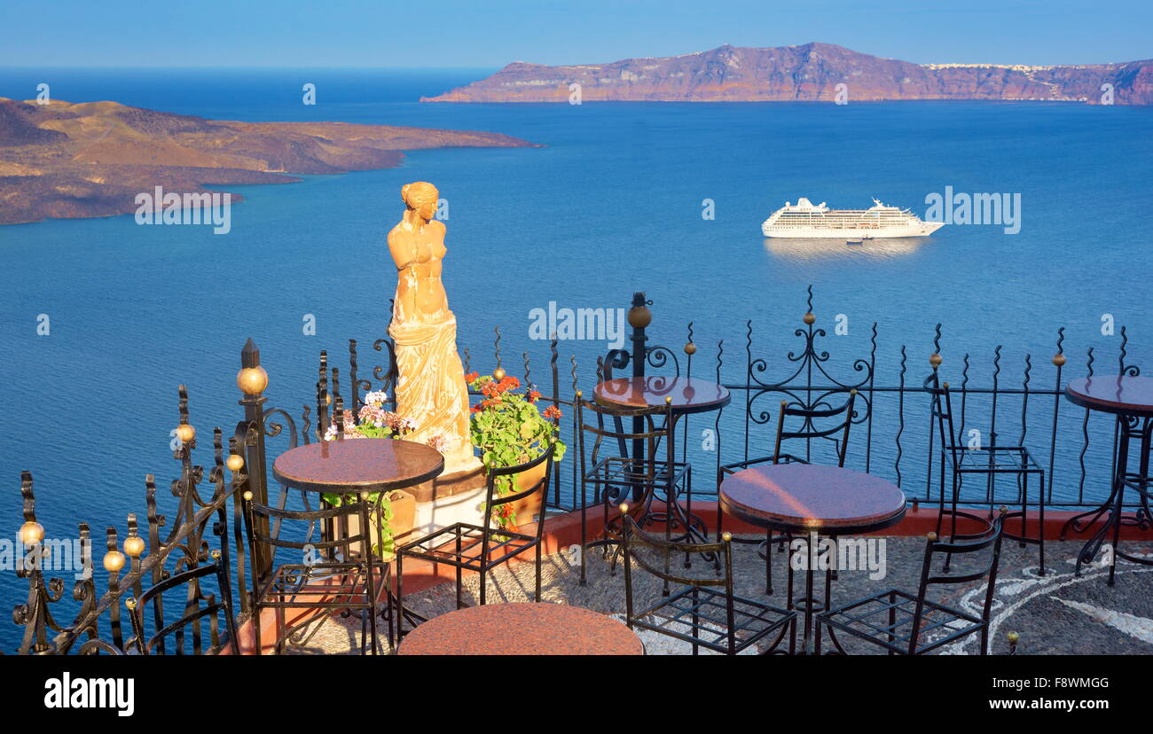 Thira Town (capital city of Santorini) - restaurant terrace with statue of Aphrodite, Santorini Island,  Greece Stock Photo