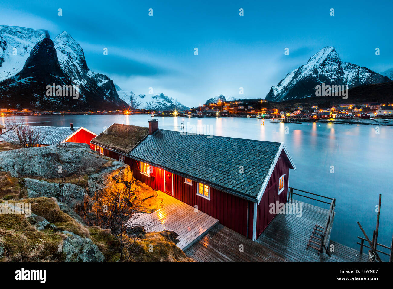 Red House In Winter With A View Of The Fjord The Fishing Village Of Stock Photo Alamy