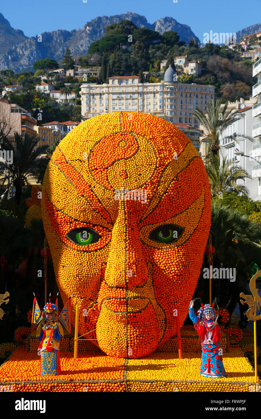82nd Lemon Festival, Fête du Citron, Chinese mask, face made of lemons and oranges, Jardins Bioves, Menton Stock Photo