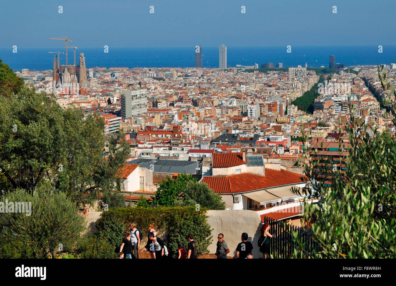 View from the Parc Güell towards the city, with Sagrada Familia, Mediterranean Sea behind, Barcelona, Catalonia, Spain Stock Photo