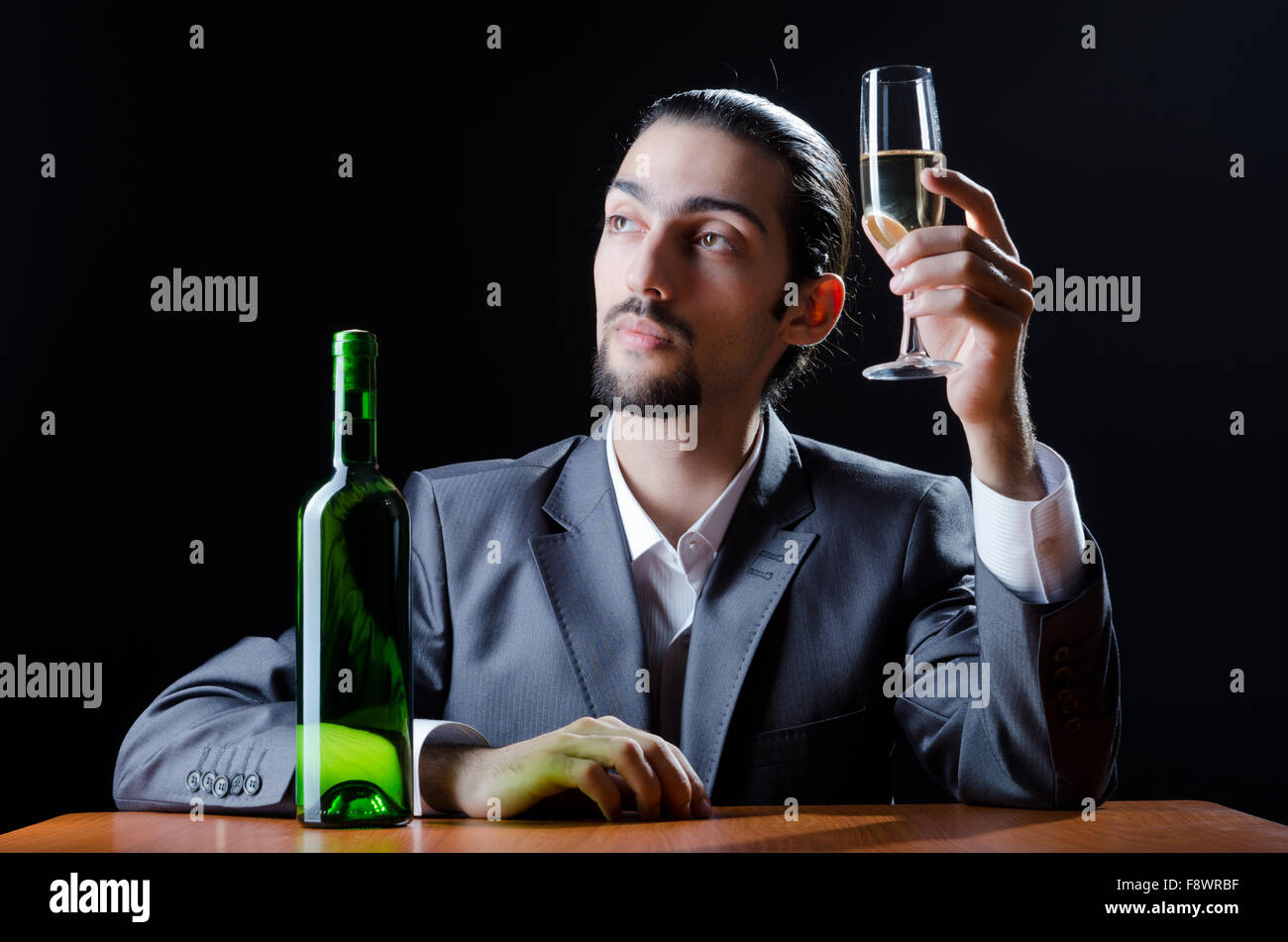 Man tasting wine in glass Stock Photo - Alamy