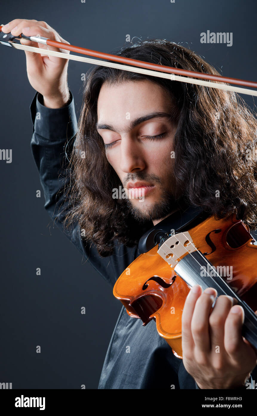 Violin player playing the intstrument Stock Photo Alamy