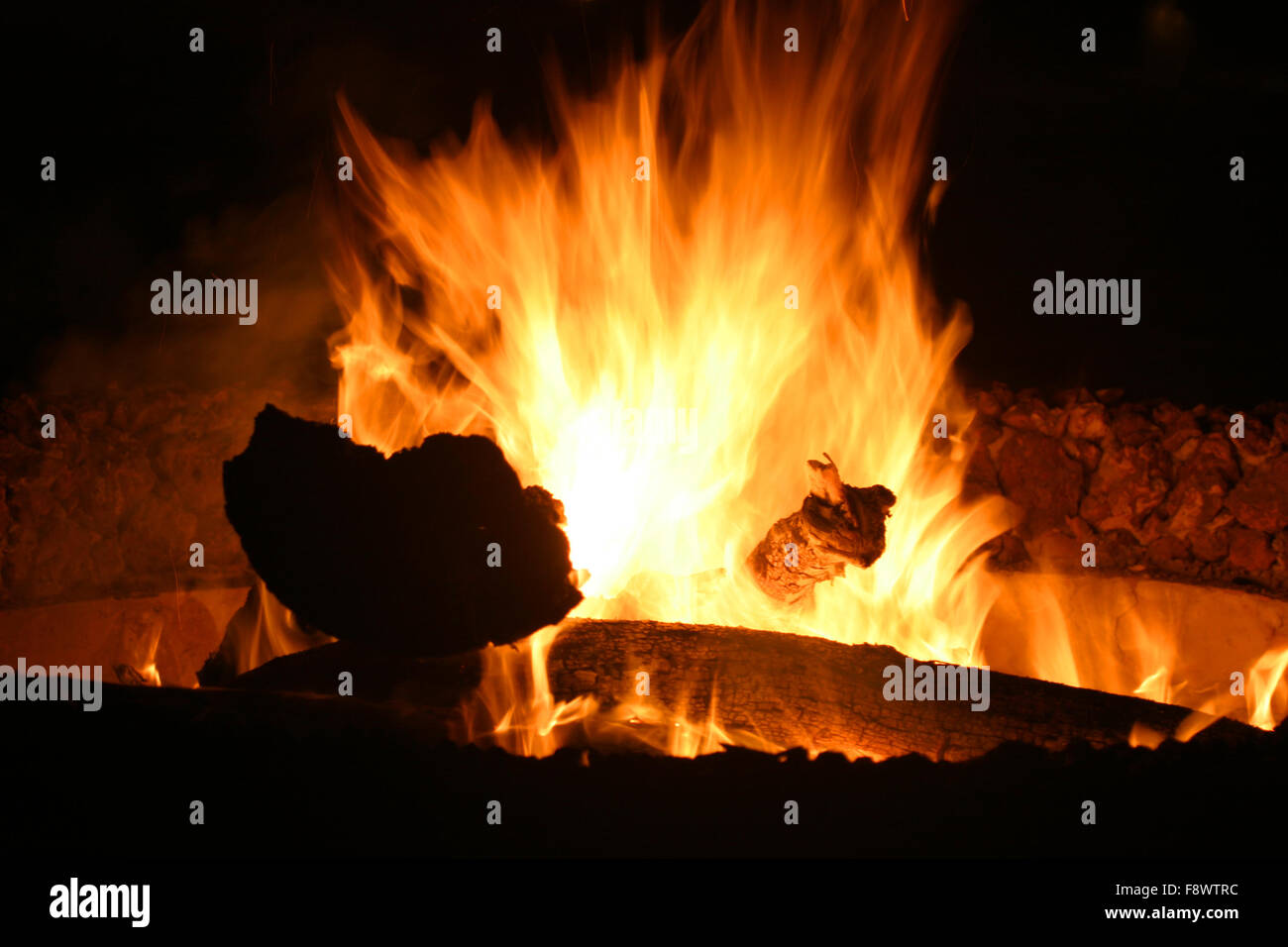 Close shot of fire on black background Stock Photo