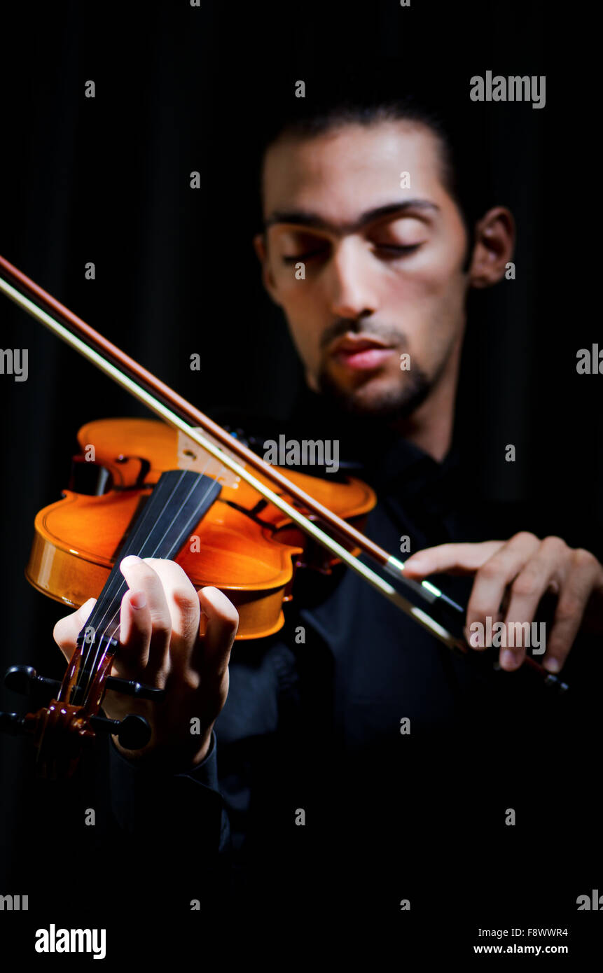 Violin player playing the intstrument Stock Photo Alamy
