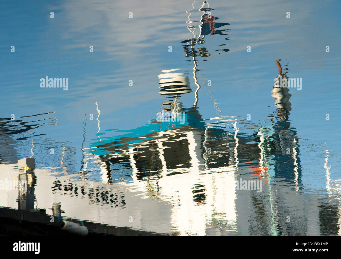 Reykjavik, Iceland. Reflection on the water of a boat. Stock Photo