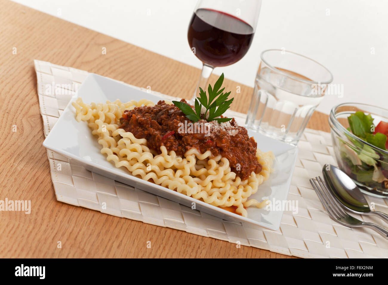 fusilli lunghi pasta and sauce bolognese on a plate Stock Photo