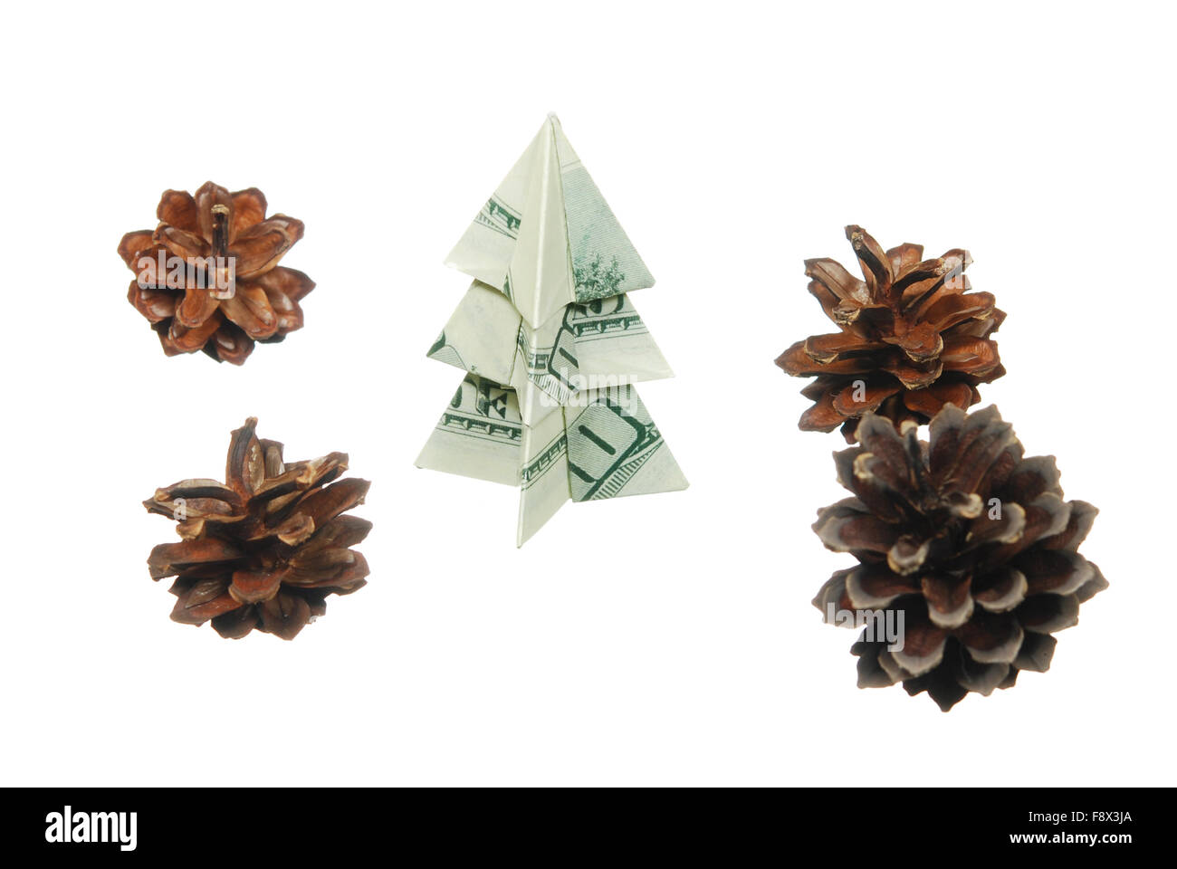 Christmas tree made of hundred dollar bills with a bump on a white