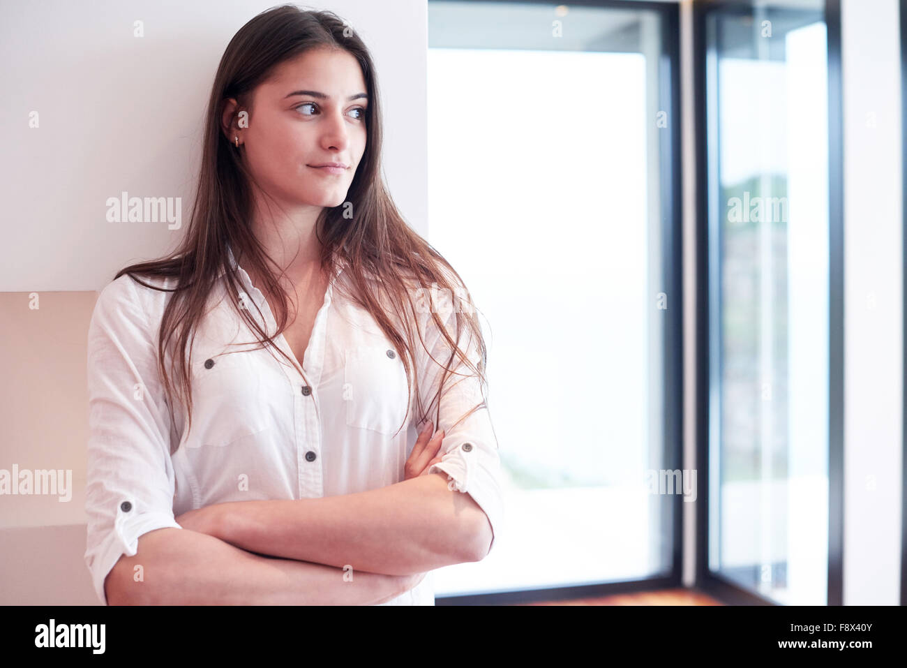 portrait of happy young beautiful woman at home Stock Photo - Alamy