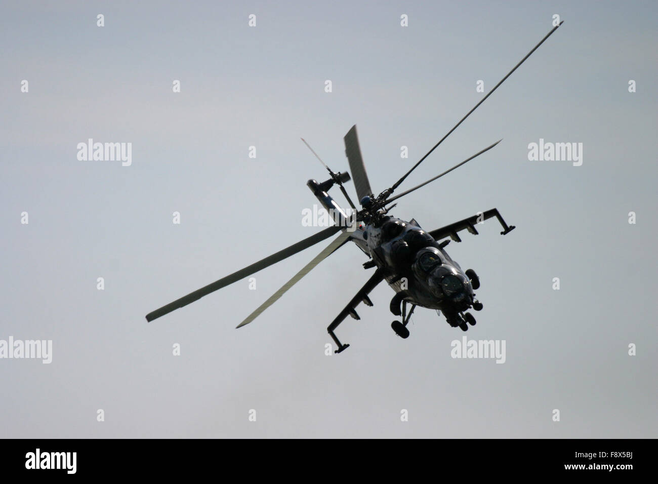 Attack helicopter in flight Stock Photo