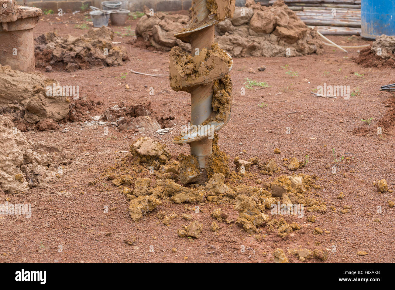 machine for drilling holes in the ground at construction site Stock