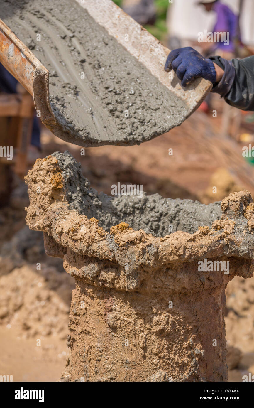Pouring cement with steel poles for construction Stock Photo Alamy