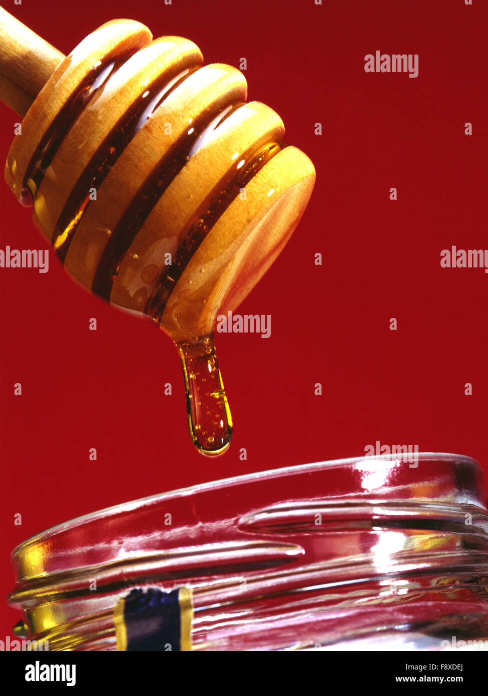 Honey Dropping From Server Stock Photo - Alamy