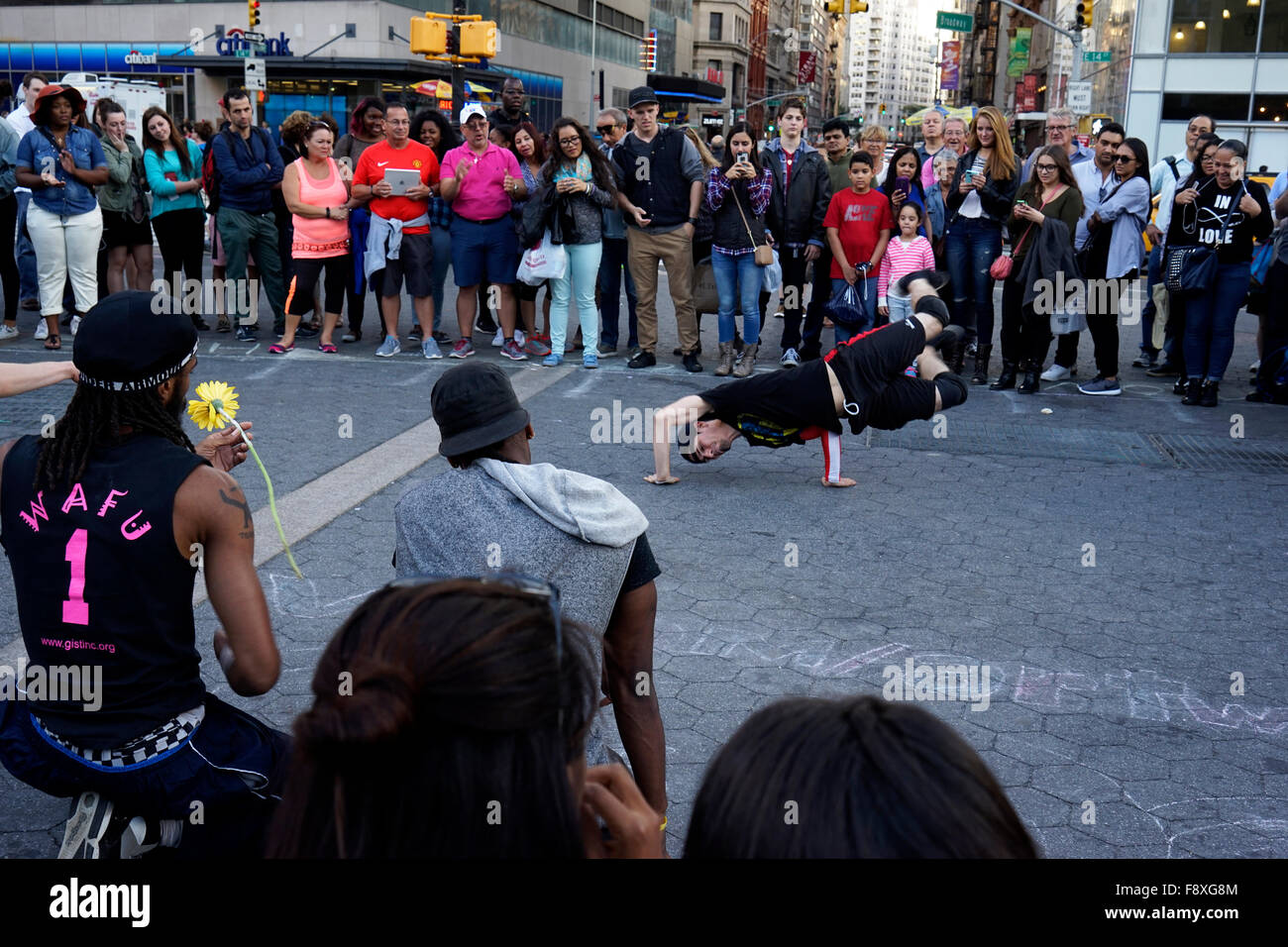 Street performer breakdancing at Union Square, Manhattan,New York City, New York.USA Stock Photo