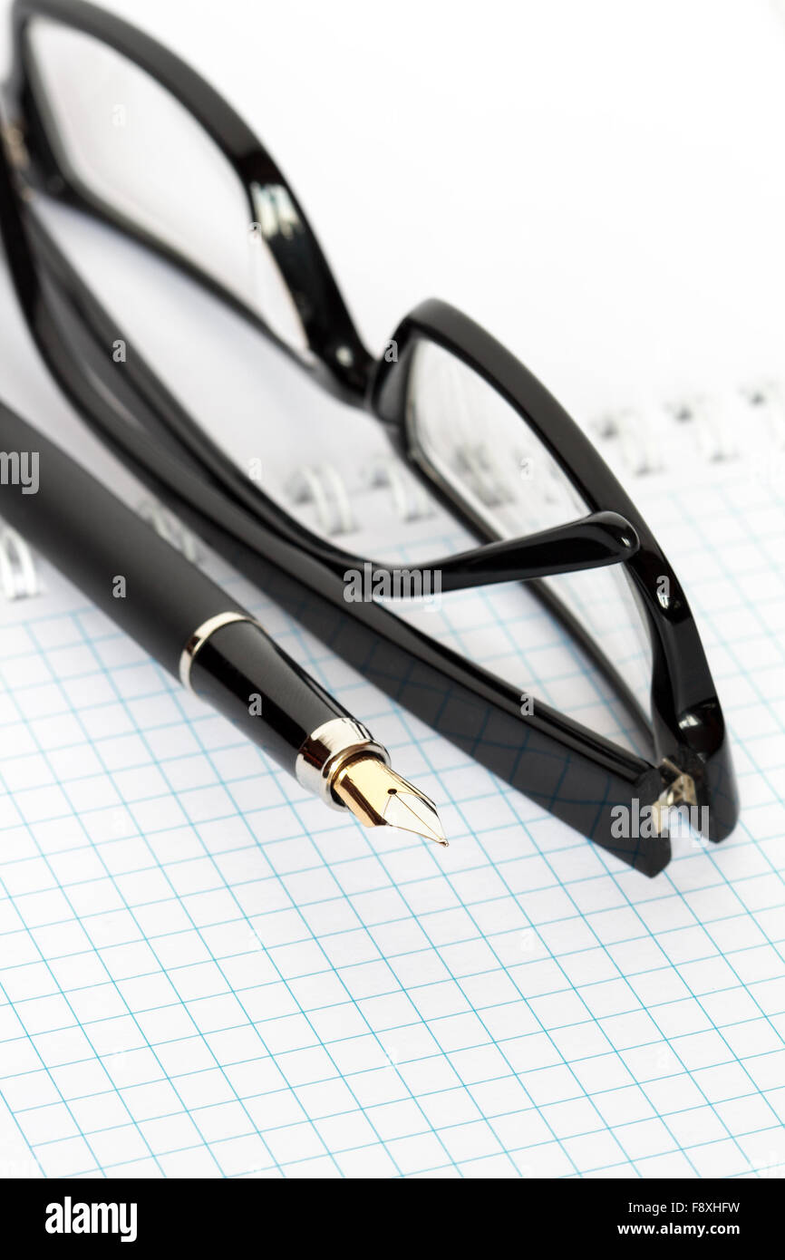 Pen And Spectacles Stock Photo