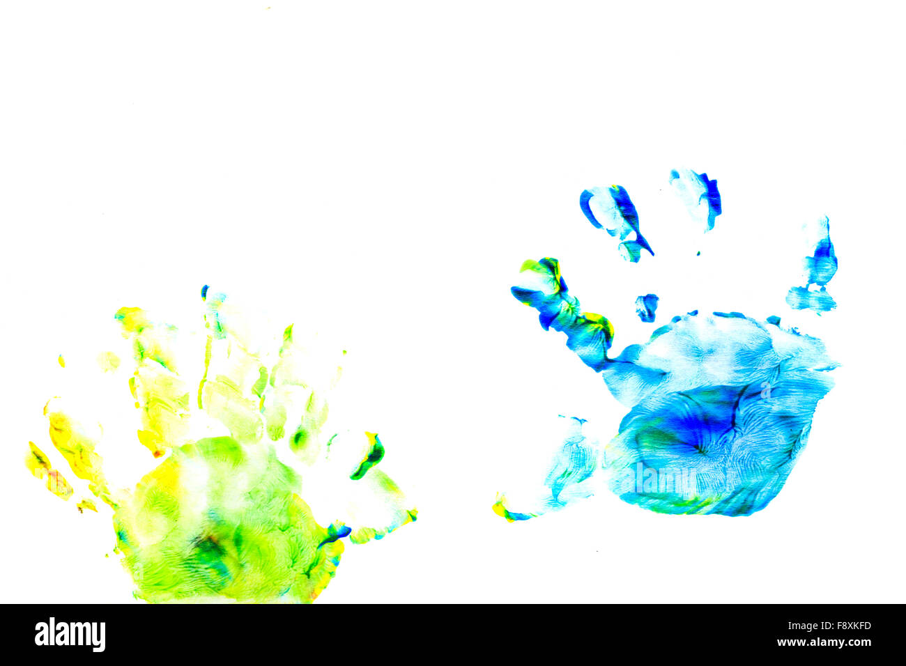 Abstract the oil paint. Prints of children's handprints. Paint brush