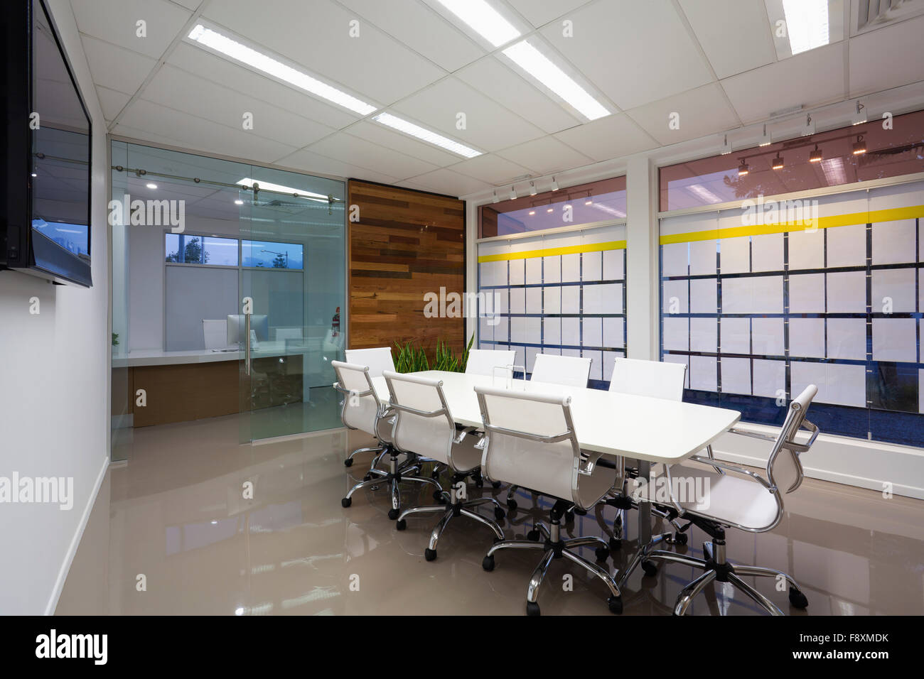 New board room with table chairs and LCD display Stock Photo - Alamy