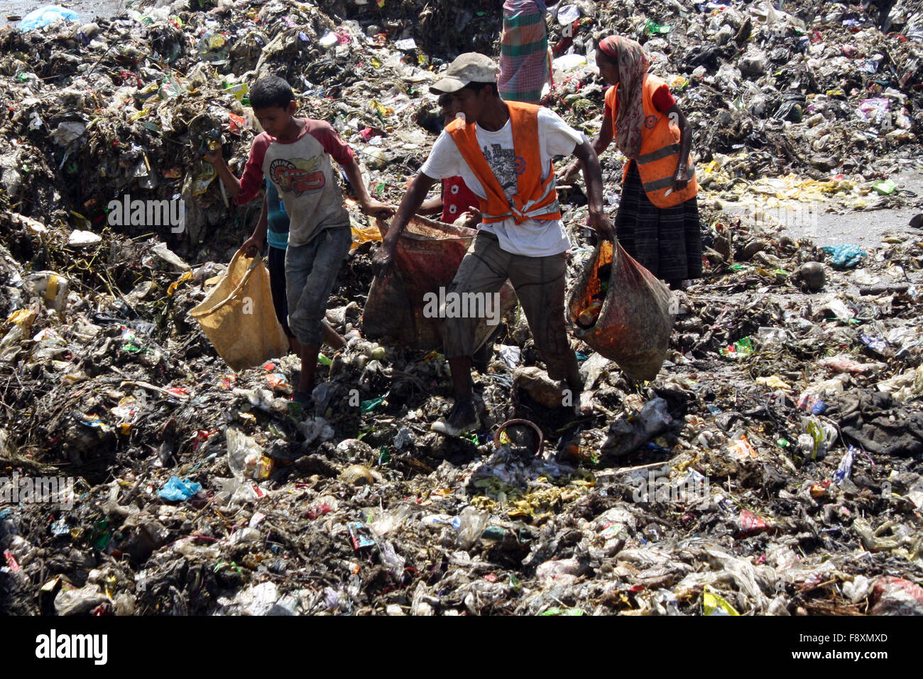 Child waste pickers pick the non biodegradable waste to be used for