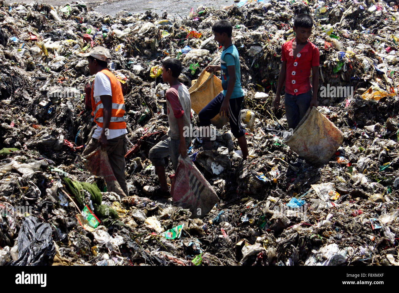 Child waste pickers pick the non biodegradable waste to be used for
