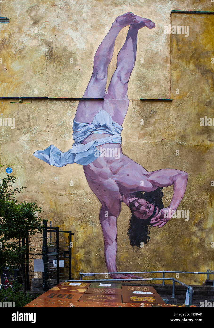 Breakdancing Jesus mural unveiled in Bristol, Artist Cosmo Sarson painted the 8.5 met Stock Photo