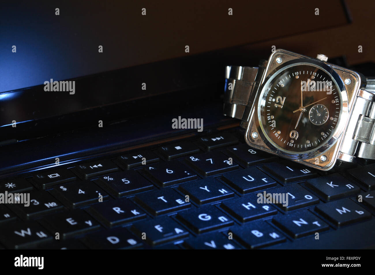 Watch On Computer Keyboard Stock Photo Alamy