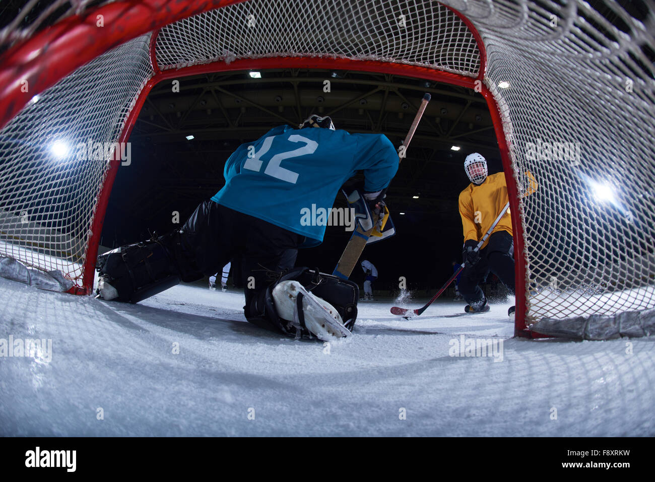 ice hockey goalkeeper player on goal in action Stock Photo Alamy