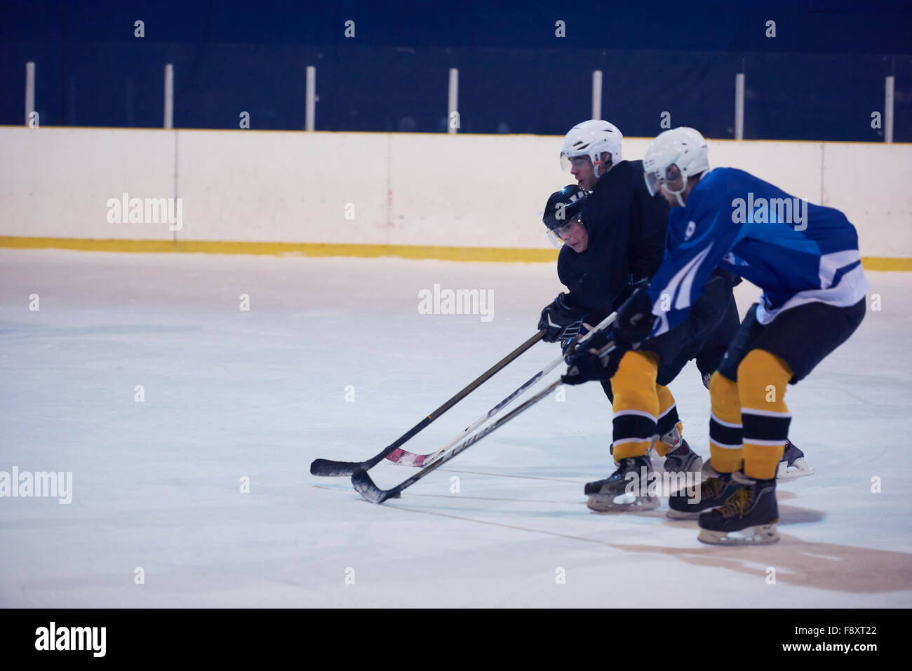 ice hockey sport players in action, business comptetition concpet Stock Photo