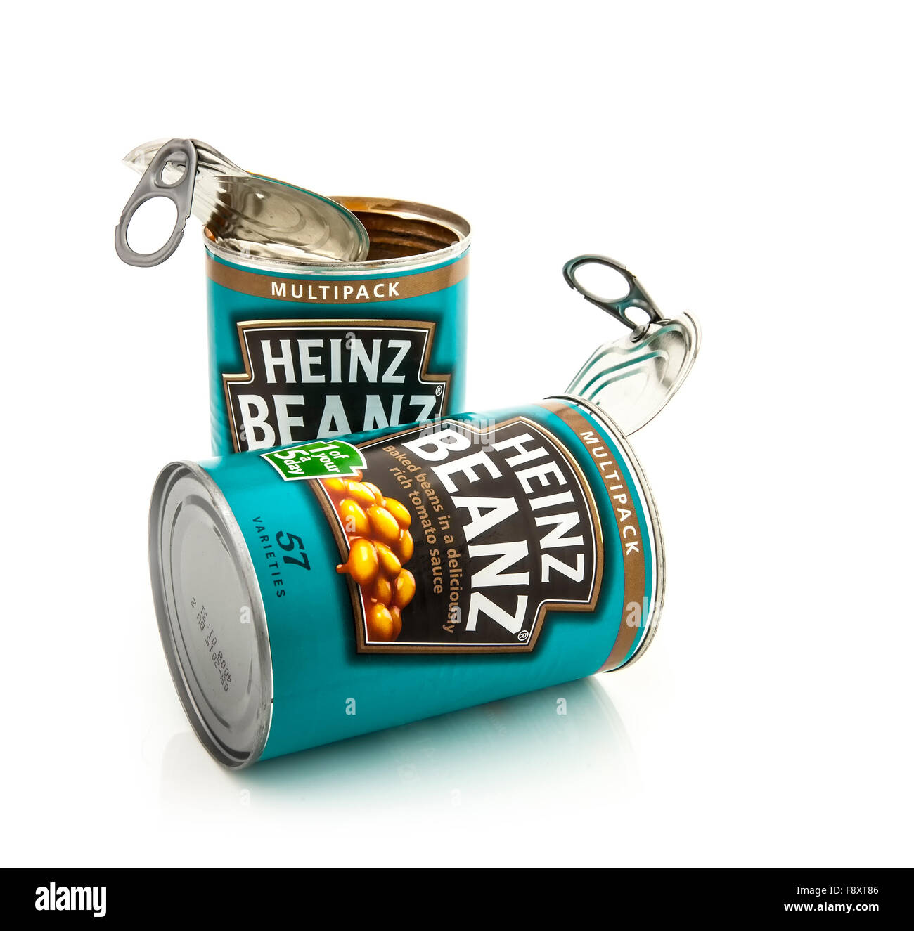 Two Cans of Heinz Beanz baked beans in tomato sauce isolated on white background. Stock Photo