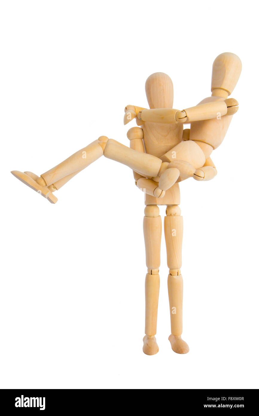 Puppet carries puppet on his arms Stock Photo